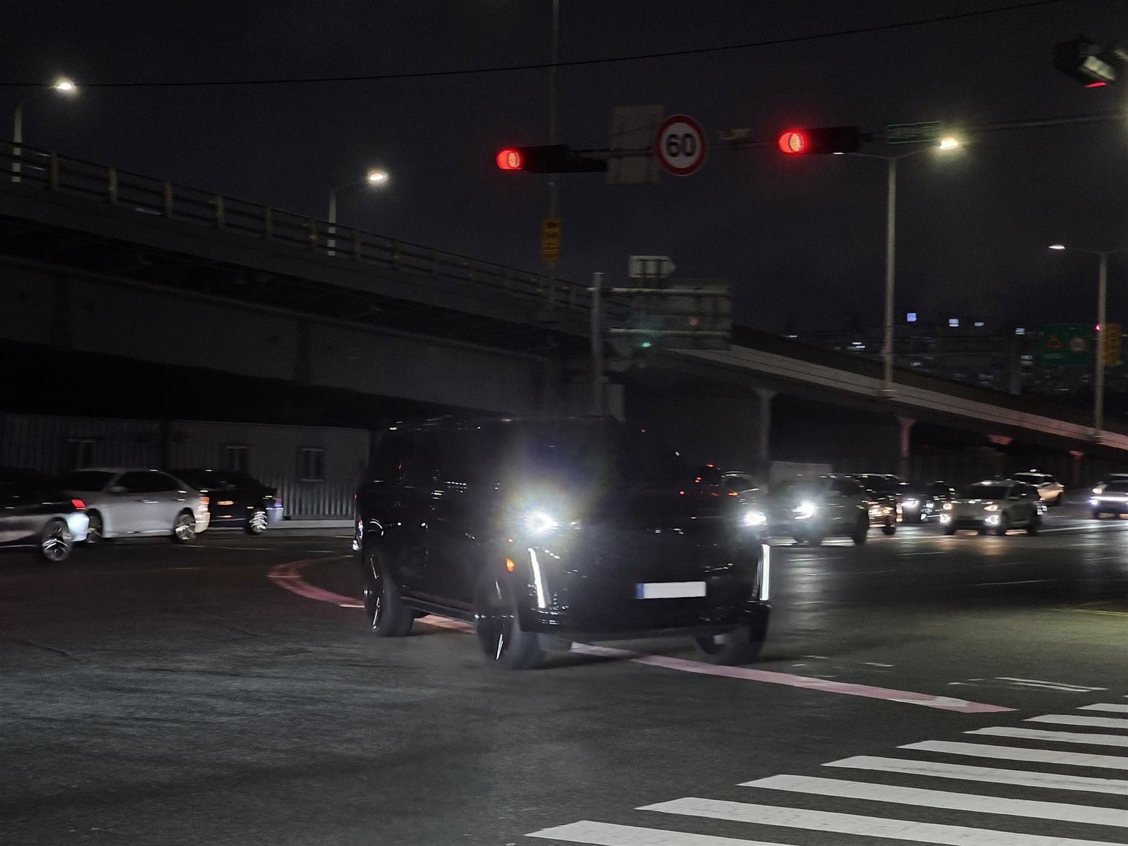 Luxury SUV driving through Guadalajara at night